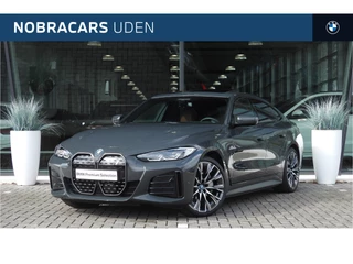 BMW i4 eDrive40 High Executive M Sport Automaat / Glazen schuif-kanteldak / Comfort Access / Harman Kardon / Stoelverwarming / Parking Assistant Plus