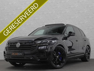 Volkswagen Touareg R 3.0 TSI 462PK E-Hybrid | Luchtvering | Puglia Leder | Panorama | ACC | Trekhaak | 22'' | Stoelventilatie | Nachtzicht | Head-Up | Standkachel | Ergo-Comfort | Sfeerverlichting | 4-Zone Clima | Stuurverwarming | Black-Optic | Dodehoek | Lane-Assist | Carplay | Draadloos Laden | BOVAG Garantie |