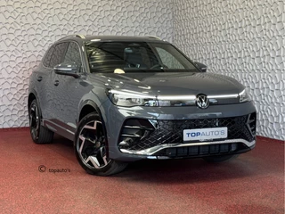 Volkswagen Tiguan 1.5 eTSI R-LINE 3D LED GRILL 19''LMV ERGO.STOEL MASSAGE DESIGN PACK STOEL/STUUR VERW TREKHAAK 09/2024 "Volkswagen rijden begint bij Topautos.nl – 75 topmodellen direct op voorraad!"