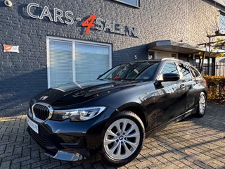 BMW 3 Serie 318I Touring Autom. Business Edit. + Leder + Led + Navi + D-glas