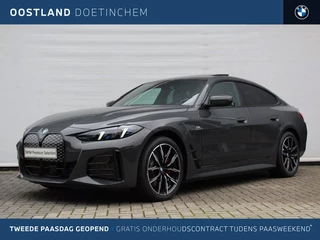BMW i4 eDrive40 Gran Coupé M Sport / Schuif-kanteldak / Achteruitrijcamera / Adaptieve LED / Active Cruise Control / Comfort Access / Stuurverwarming