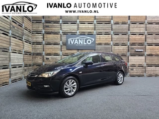 Hoofdafbeelding Opel Astra Opel Astra Sports Tourer 1.4 Turbo S/S Navi Clima PDC Bluetooth Trekhaak 16"LM
