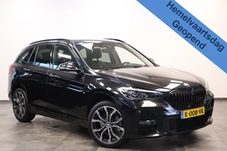 BMW X1 sDrive20i High Executive M-sport Panoramadak PDC Trekhaak NAP Head-Up * Hemelvaartsdag geopend van 12:00 tot 17:00u *