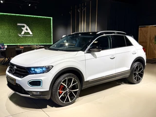 Hoofdafbeelding Volkswagen T-Roc Volkswagen T-Roc 1.5 TSI Sport DSG Navi|Keyles|Camera|ACC|Led Wit!