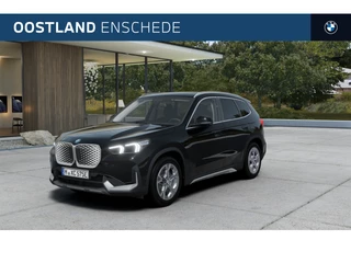 Hoofdafbeelding BMW iX1 BMW iX1 eDrive20 xLine / Trekhaak / Achteruitrijcamera / Adaptieve LED / Comfort Access / Stoelverwarming