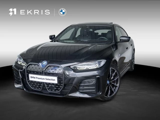 BMW i4 eDrive40 | M Sport | Stoelverwarming | Schuif-/kanteldak | Active Cruise Control | Parking Assistant Plus | 19''