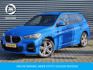 BMW X1 sDrive20i M Sport 192pk Misano Blauw Metallic | Sportstoelen Verwarmd | Navi Pro | Sfeerverlichting | LED Koplampen | 18"L.M | Sportstuur |