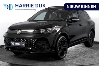 Hoofdafbeelding Volkswagen Tiguan Volkswagen Tiguan 1.5 eHybrid 272 PK R-Line | Black Style | Elek. Trekhaak | S/K-panodak | Adapt. Cruise | Stoel-+stuurverw. | App. Connect | Camera | PDC | LM 20" | 8069