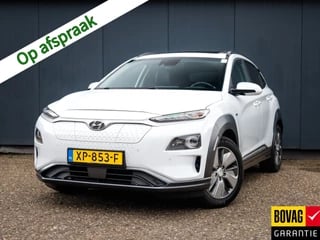 Hyundai Kona EV Premium 64 kWh (204 PK) 1e-Eig, Keurig-Onderh, 12-Mnd-BOVAG, NL-Auto, Schuifkanteldak, Navigatie/Apple-Carplay/Android-Auto, Adaptive-Cruisecontrol. Keyless-Entry/Start, Achteruitrijcamera, Licht-Zicht-Pakket, Parkeersensoren-V+A, Head-Up, Stoelverwarming-V+A, Stuurverwarming, DAB, Privacy-Glas