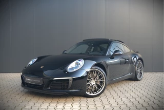 Porsche 911 3.0 Carrera | Panoramadak | Bose | Sport Chrono | Sport Uitlaat | Spyder RS Design Velgen | GT Sportstuur | Stoelverwarming | Stuurverwarming | Navigatie | Cruise Control | Leer | Origineel Nederlands | 