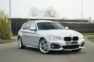 Hoofdafbeelding BMW 1 Serie BMW 1-serie 120i M-Sport Centennial High Executive Schuifdak|Stoelverw.|Keyless-Go