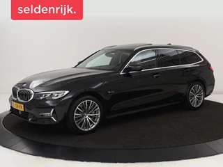 BMW 3-serie 330e xDrive Luxury Line | Panoramadak |  Adaptive cruise | Stoelverwarming | Leder | Sportstoelen | Trekhaak | Sfeerverlichting | Live Cockpit | Carplay | Memory | PHEV | Plug In