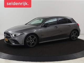 Mercedes-Benz A-klasse 180 AMG | Stoelverwarming | Leder/Alcantara |  Sfeerverlichting | Widescreen | Full LED | Park Assist | Navigatie | Sportstoelen | Climate control | Cruise control