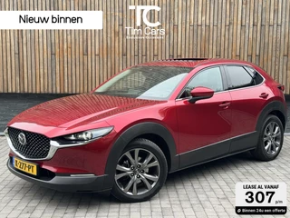 Mazda CX-30 2.0 e-SkyActiv-X M Hybrid Luxury Automaat | Open dak | Bordeauxrode lak | Stoel en- Stuurwielverwarming | Rondomzicht camera | Afneembare trekhaak | Lederen bekleding | Bose audio | Parkeersensoren voor en achter