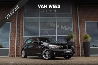 BMW 1-serie 116i Business | Sportstuur | Stoelverwarming | Radio Professional | Zichtpakket | PDC | Middenarmsteun | Regensensor | Mistlampen | 17 inch | Lichtsensor