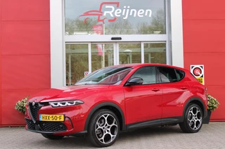 Alfa Romeo Tonale 1.3T PHEV 280pk Edizione Business | HARMAN/KARDON PREMIUM AUDIO | PREMIUM PACK: LEDEREN BEKLEDING/GEVENTILEERDE VOORSTOELEN/4-VOUDIG ELEKTRISCH VERSTELBARE LENDESTEUN VOORSTOELEN | WINTERPACK: STOEL/STUUR VERWARMING | TECHNOLOGY PACK: PARKEERWAARSCHUWING VOOR EN ACHTER/360° CAMERA/AUTOMATISCH INPARKEREN/ AUTONOMOUS DRIVING LEVEL 2: ADAPTIVE CRUISE CONTROL/LANE CENTERING ASSIST/TRAFFIC JAM ASSIST DODEHOEK DETECTIE AUTOMATISCH DIMMENDE BUITENSPIEGELS | DRAADLOZE TELEFOONLADER | FULL LED MATRIX KOPLAMPEN | DUAL STAGE VALVE: ACTIEVE DEMPING | KEYLESS ENTRY/START | 1MM 19'' DIAMOND CUT DARK LICHTMETALEN VELGEN | NAVIGATIE | DRAADLOZE APPLE CARPLAY/ANDROID AUTO | ELEKTRISCH BEDIENBARE ACHTERKLEP |