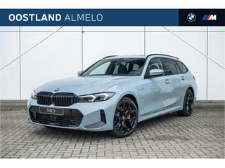Hoofdafbeelding BMW 3 Serie BMW 3 Serie Touring 330e High Executive M Sport Automaat / Panoramadak / Trekhaak / Sportstoelen / Adaptieve LED / Comfort Access / Active Cruise Control / Parking Assistant Plus