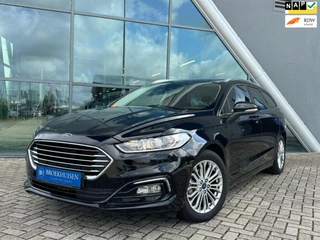 Hoofdafbeelding Ford Mondeo Ford Mondeo Wagon 2.0 IVCT HEV Titanium 191pk Automaat / Stoelverwarming / Navigatie