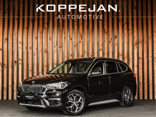 BMW X1 sDrive20i Orange Edition III | HEAD-UP | PANORAMADAK | STOELVERWARMING | NAVI |