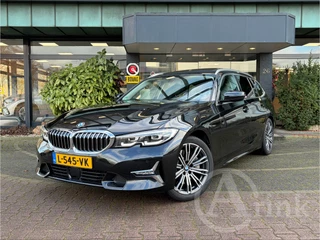 BMW 3 Serie Touring 330i High Executive Panoramadak, Trekhaak, Harman/Kardon