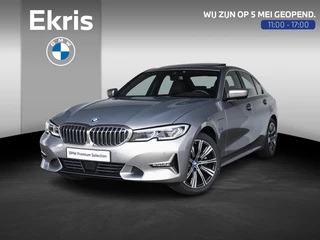 BMW 3 Serie Sedan 320e | High Executive | Parking Pack | Achteruitrijcamera | Schuif-/kanteldak | Stoelverwarming | 18'' | Lentevoordeel