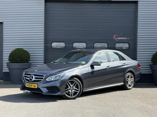 Hoofdafbeelding Mercedes-Benz E-Klasse Mercedes-Benz E-klasse 350 BlueTEC 4MATIC AMG | Navigatie | Harmon Kardon | Camera | Xenon | Climate Control |