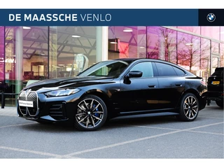 Hoofdafbeelding BMW i4 BMW i4 eDrive35 Gran Coupé M Sport / Active Cruise Control / Comfort Access / Parking Assistant / Stoelverwarming / Widescreen Display / Live Cockpit Plus