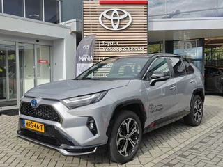 Toyota RAV4 2.5 Plug-in Hybrid AWD Bi-Tone Plus STOEL/STUURVERW STOELVENT NAVI 360-CAMERA PARKSENSOREN HEAD-UP APPLE/ANDROID LEDER BLINDSPOT EL-STOEL+GEHEUGEN JBL-AUDIO EL-ACHTERKLEP 19"LMV