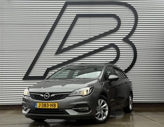 Opel Astra Sports Tourer 1.2 Business Edition 2e Eigenaar,Apple Carplay,Airco,Camera,Cruise,PDC,Trekhaak,N.A.P,APK tot 07-2026