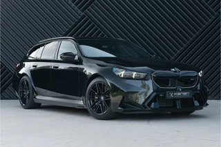 Hoofdafbeelding BMW M5 BMW M5 Touring V8 Hybride M Keramisch Pano Alcant.Hemel Bowers&Wilkins Trekhaak