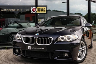 Hoofdafbeelding BMW 5 Serie BMW 5-serie Touring 520i M Sport - MEMORY - COMFORTSTOELEN - LED
