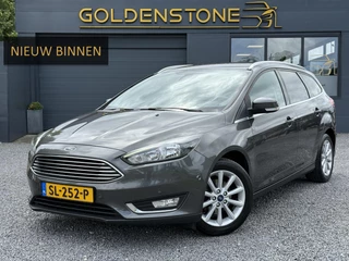 Ford Focus Wagon 1.0 Titanium 2e Eigenaar,125pk,Navi,Trekhaak,Stuurverwarming,Stoelverwarming,6 Bak,Pdc,Lmv,Apk tot 04-2026