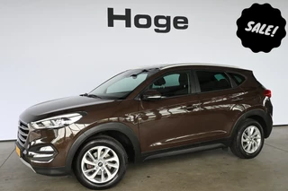 Hoofdafbeelding Hyundai Tucson Hyundai Tucson 1.6 GDi Comfort Stoel/Stuur verwarming Climate control Cruise control Trekhaak Navigatie Inruil Mogelijk!
