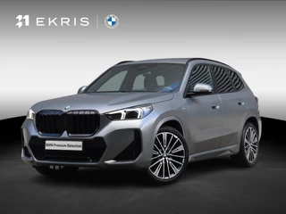 BMW X1 sDrive18i | M Sportpakket | Panodak | Trekhaak | Getint Glas | Comfort Access | Camera | Apple Carplay | Stuurwiel Verwarmd | 20'' LMV