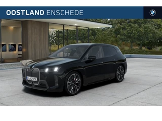 Hoofdafbeelding BMW iX BMW iX xDrive60 M Sport / Panoramadak / Trekhaak / Adaptief onderstel / Soft-Close / Stoelventilatie / Parking Assistant Professional / Adaptieve LED / Harman Kardon