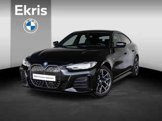Hoofdafbeelding BMW i4 BMW i4 eDrive40 M Sport | Achteruitrijcamera | Stoelverwarming | Active Cruise Control | 18'' | Trekhaak
