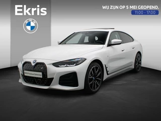 BMW i4 eDrive40 M Sportpakket Pro | Stuurwielrand Verwarmd | Achteruitrijcamera | Schuifdak | DAB | HiFi | 19''
