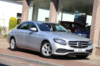 Hoofdafbeelding Mercedes-Benz E-Klasse Mercedes-Benz E-Klasse 250 Ambition 9G Widescreen Navi Camera LED Ambiente