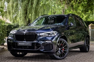 Hoofdafbeelding BMW X5 BMW X5 xDrive45e M Sport Sky Lounge Pano 22" Harman Kardon HUD ACC