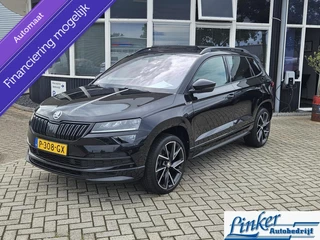 Skoda Karoq 1.5 TSI ACT Sportline Business -PANO TREKHAAK NL-AUTO CAMERA PDC