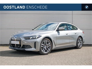 BMW i4 eDrive40 / Trekhaak / Achteruitrijcamera / Comfort Access / PDC / Cruise Control / Widescreen Display