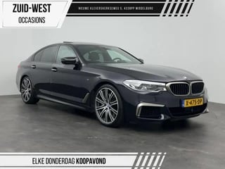 Hoofdafbeelding BMW 5 Serie BMW 5 Serie M550i xDrive High Executive B&W Stoelkoeling 360 ACC Soft