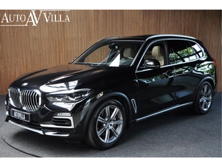 Hoofdafbeelding BMW X5 BMW X5 xDrive45e Panorama Harman Kardon Leer Carplay Ambient Keyless ACC Elektrische achterklep Trekhaak elektrisch uitklapbaar