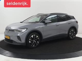 Volkswagen ID.4 Tech 77 kWh | SOH 92,2% | Panorama | 360 Camera | Head up | Virtual cockpit | Sfeerverlichting | Stoel/Stuurverwarming | Adaptive cruise | Carplay | Traffic assist | Climate control | Half leder/velours