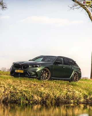 BMW M5 Touring keramisch pano trekh NL-auto M Driv.Pack 22"