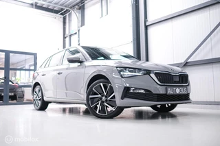 Skoda Scala 1.0 TSI Sport Business | Sportstoelen | Trekaak | NAP NL auto | LED | Adaptive cruise | Clima | Dealer oh | 17 inch | CarPlay | Steel Grey |