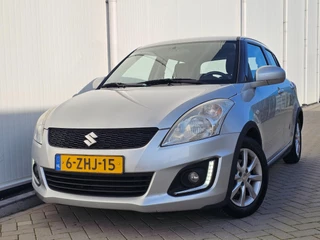 Hoofdafbeelding Suzuki Swift Suzuki Swift 1.2 Dynamic EASSS bj 2015 Dealer o.h. Nw.APK Veel Opties!