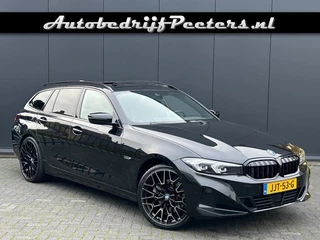 BMW 3 Serie Touring 330e xDrive Pano ACC Leder H/K Sfeerlicht L-Cockpit Trekhaak