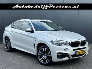 Hoofdafbeelding BMW X6 BMW X6 M50d 1e eigenaar NL-auto S-dak ACC Camera Comfortstoel HUD H/K