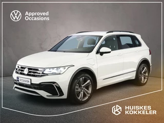 Hoofdafbeelding Volkswagen Tiguan Volkswagen Tiguan R-Line Business 1.4 TSI eHybrid 245pk DSG Automaat Adaptive cruise control, Achteruitrijcamera, Elektrische achterklep, Navigatie, Stoelverwarming, LED matrix koplampen